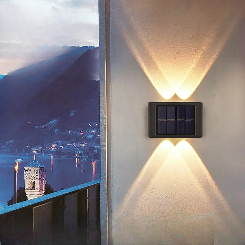 Solar powered outdoor courtyard lamp, home wall lamp decoration, new type of up and down glowing ambient wall lamp