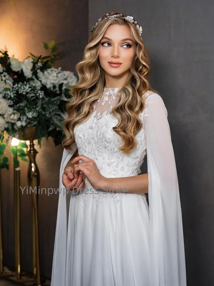 Eleganckie suknie ślubne z długimi, zwiewnymi rękawami, z wysokim dekoltem, zdobione aplikacjami i cekinami, szyte na miarę suknie ślubne z szyfonu, suknia ślubna robe de mariée