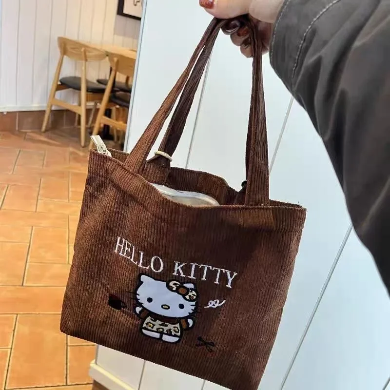 

Hello Kitty Anime MINISO Ins Fashion Embroidery Print Handbag Cute Cartoon Kawaii Large Capacity Storage Bag Gifts for Kids