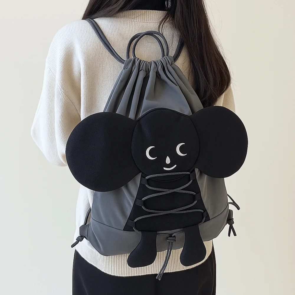 

Casual Cartoon Backpack Drawstring Large Capacity Doll School Bag Adorable Lightweight Black Double Shoulder Bag Students