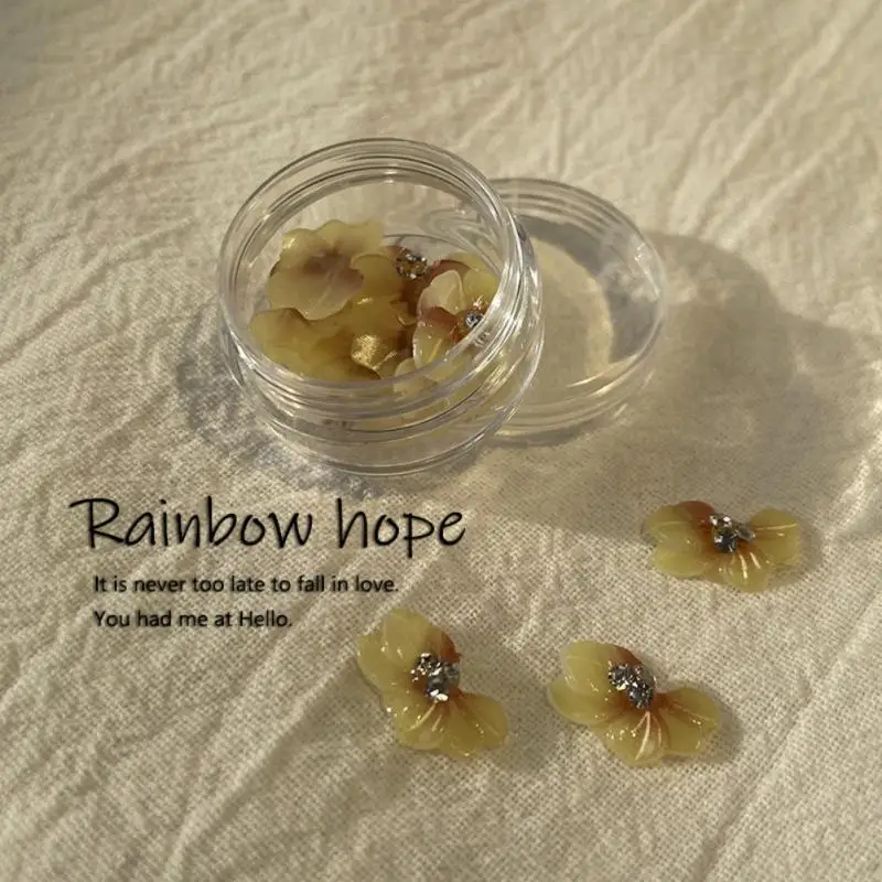 Dodaj jasne kolory Akcesoria do pielęgnacji paznokci Niełatwo uszkodzone Akcesoria Stylowe wykonane z żywicy w połączeniu z diamentami