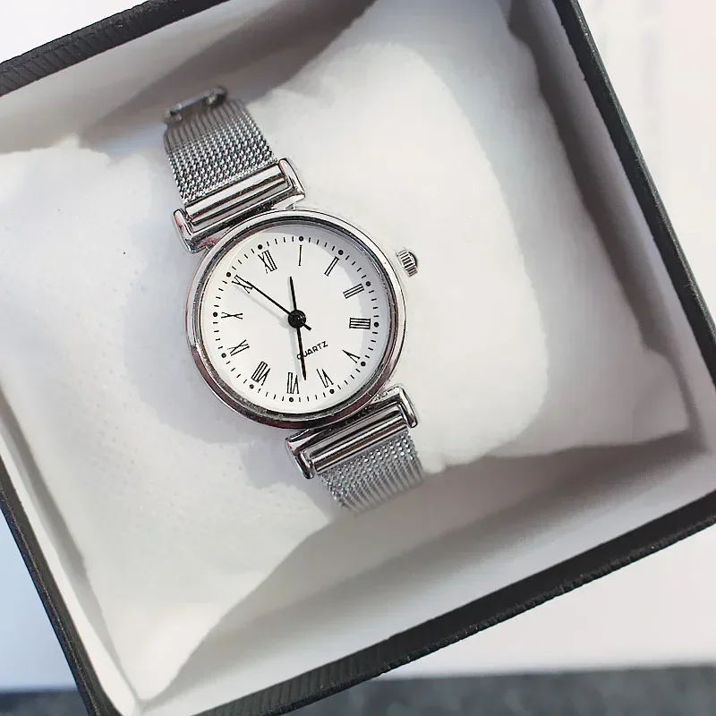 Reloj de cuarzo a la moda para mujer, relojes femeninos de lujo, reloj de pulsera, banda de acero inoxidable blanco y negro, relojes clásicos para