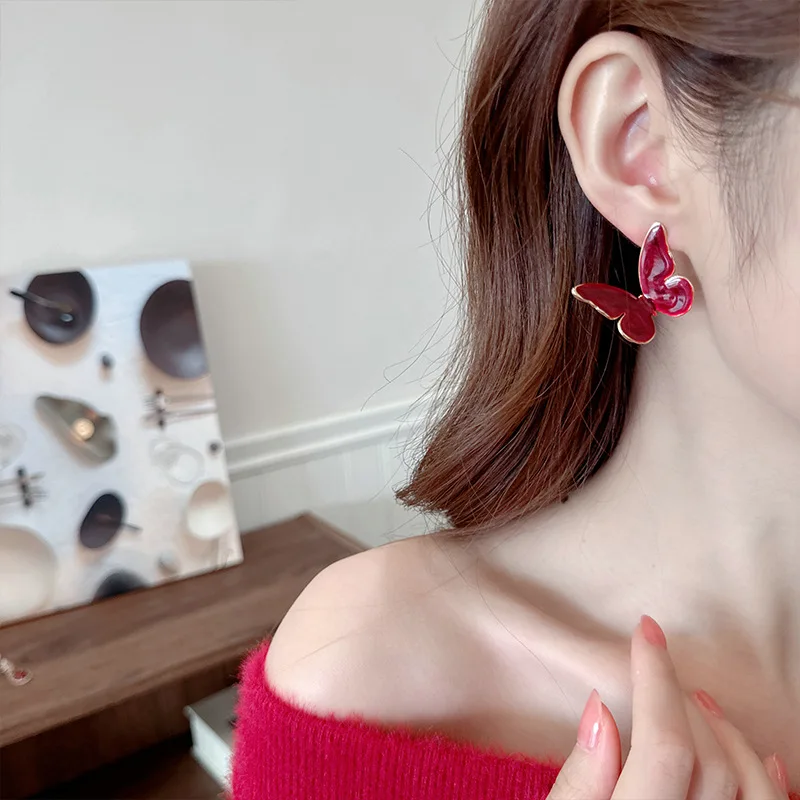 

Autumn and winter fashion trend and elegant earrings for women: Encore wine red butterfly stud earrings