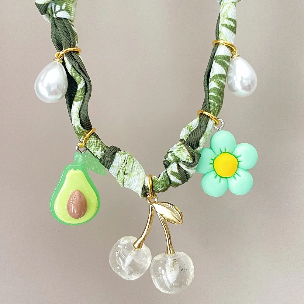 

Handmade Green Fabric Bandana Necklace for Women with Fruits Pendants-Cherry Avocado Flower Pearls
