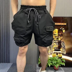 Shorts de sport décontractés pour hommes, pantalons cinq quarts multi-poches, pantalons de plage, beaux vêtements de travail, mode d'été, haute qualité