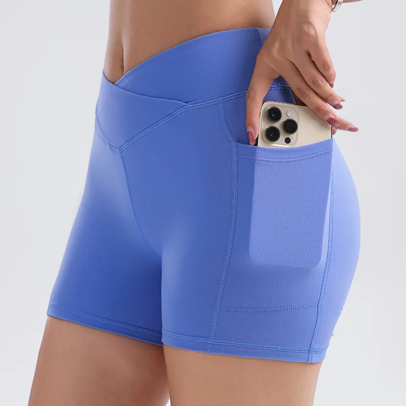 

Yoga shorts Solid color pocket bare belly lift elastic fitness shorts Women's training running Yoga wear hot pants