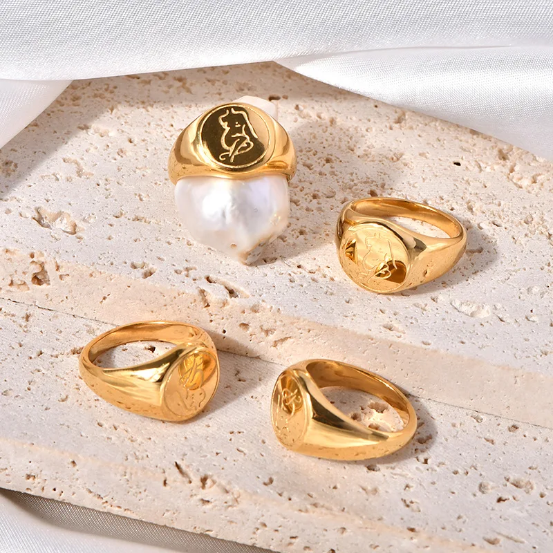 女性のためのハイエンドのバッジシールリング,ステンレス鋼のボディスタンプ,金メッキチタン,ヨーロッパとアメリカのニッチデザイン