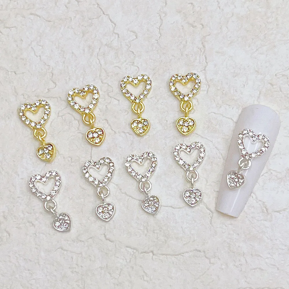 10 pièces coeur balancent ongles breloques 3D alliage luxe ongles strass argent or creux coeur ongle