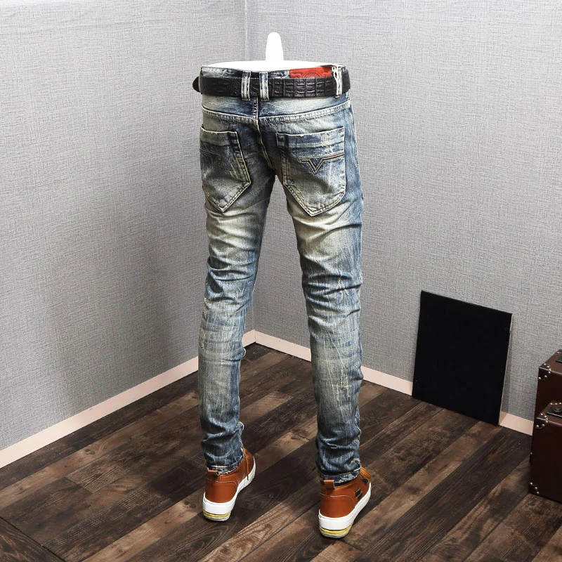 Streetwear moda masculina calças de brim retro azul fino ajuste destruído rasgado jeans retalhos designer vintage casual denim calças hombre