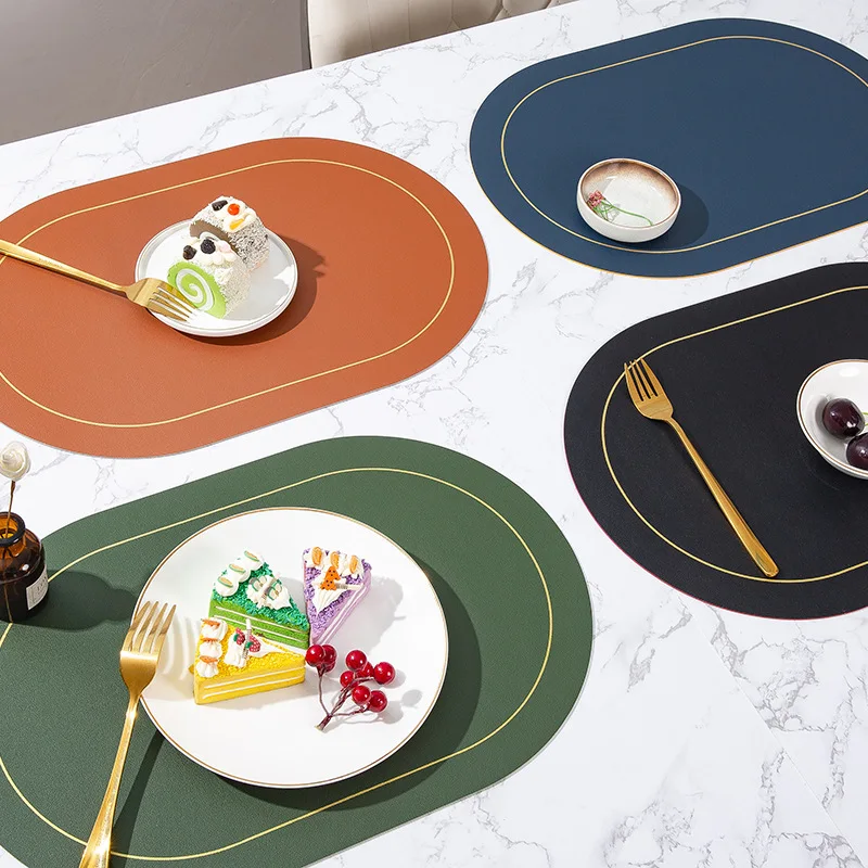 Two tone contrasting oval leather placemats for hotel and home use, waterproof, oil resistant, and heat-insulating placemats