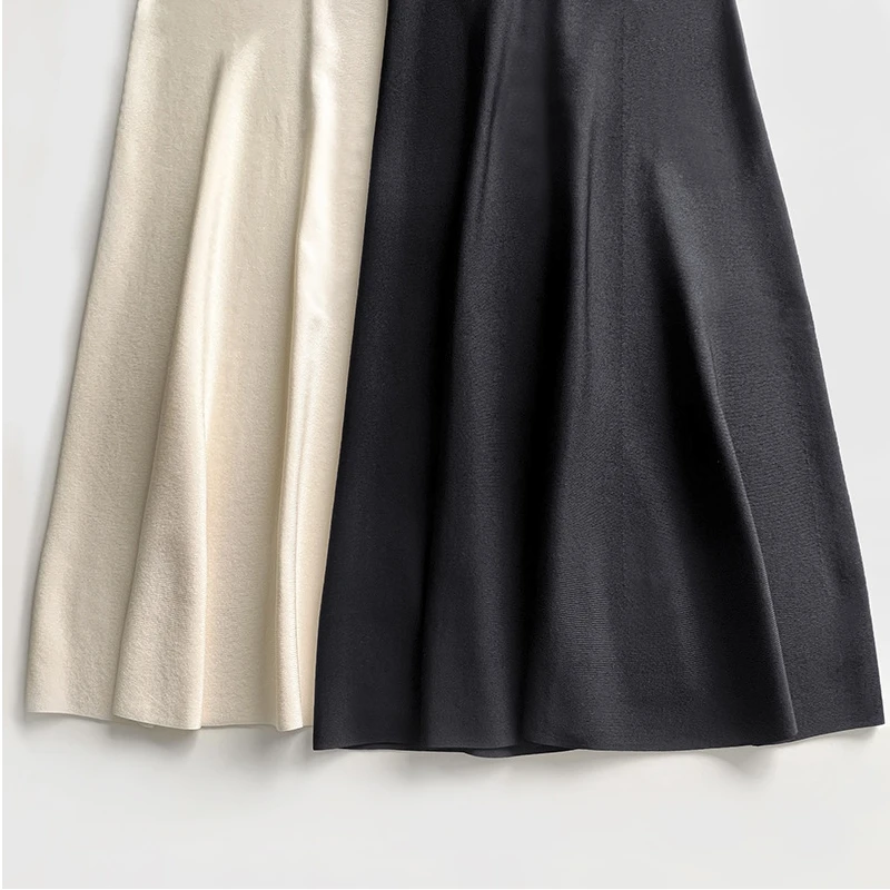 Simples, moderno e cheio de temperamento feminino de malha de cintura alta, meia saia fina, média a longa e versátil