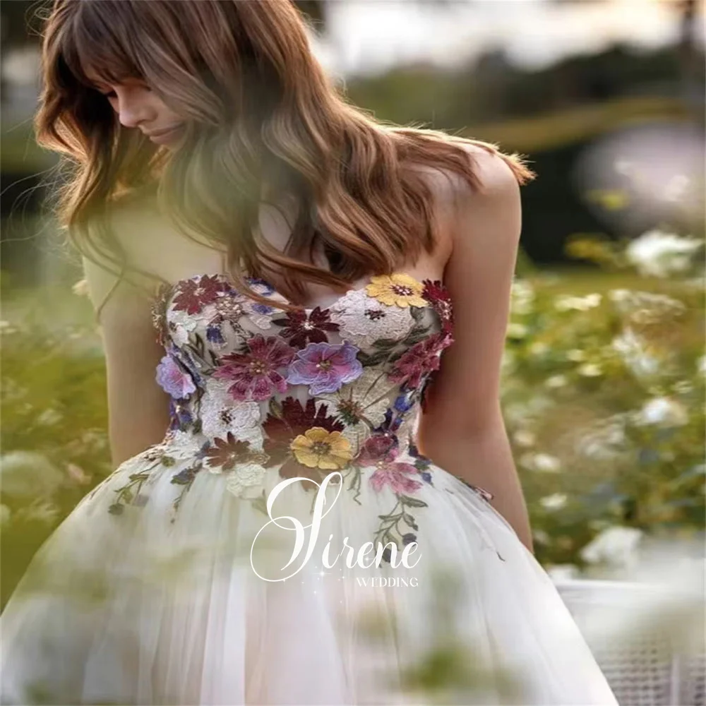 فساتين زفاف سيرين على شكل قلب بدون أكمام على شكل حرف a من التل والزهور بدون حمالات مزينة بطول الأرض بدون ظهر فستان حفلة موسيقية مخصص