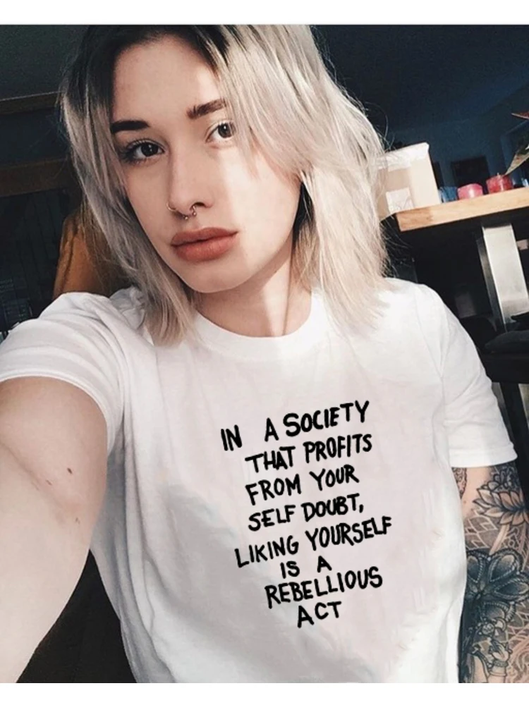 

In A Society That Profits From Yourself Doubt Liking Yourself Is A Rebellious Act Quotes T-Shirt Harajuku Ulzzang Graphic Shirt