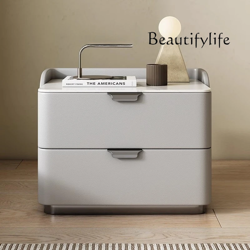 

Premium modern light luxury bedside table solid wood Italian simple bedroom storage cream wind leather