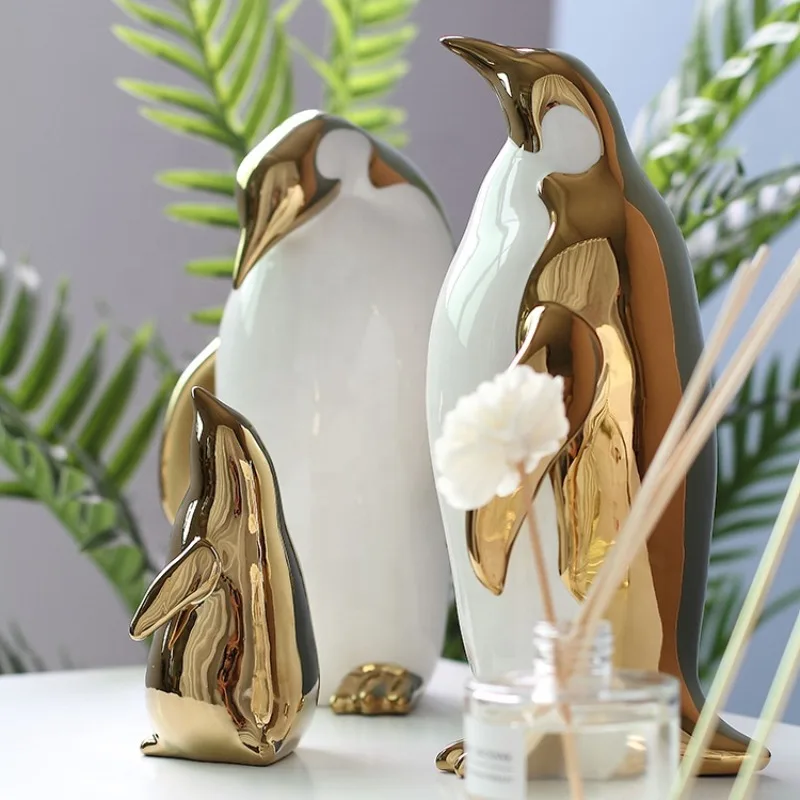 

Ceramic jewelry Golden penguin Living room gift accessories Dining table decoration Children's creative luxury decoration