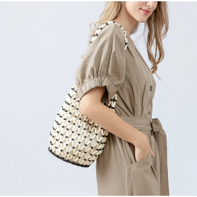 Holz Perle Gewebte Tasche Neue Design Marke frauen Hohl Perlen Meer Reise Vielseitige hand Schulter Unterarm Eimer Tasche – Detail 13