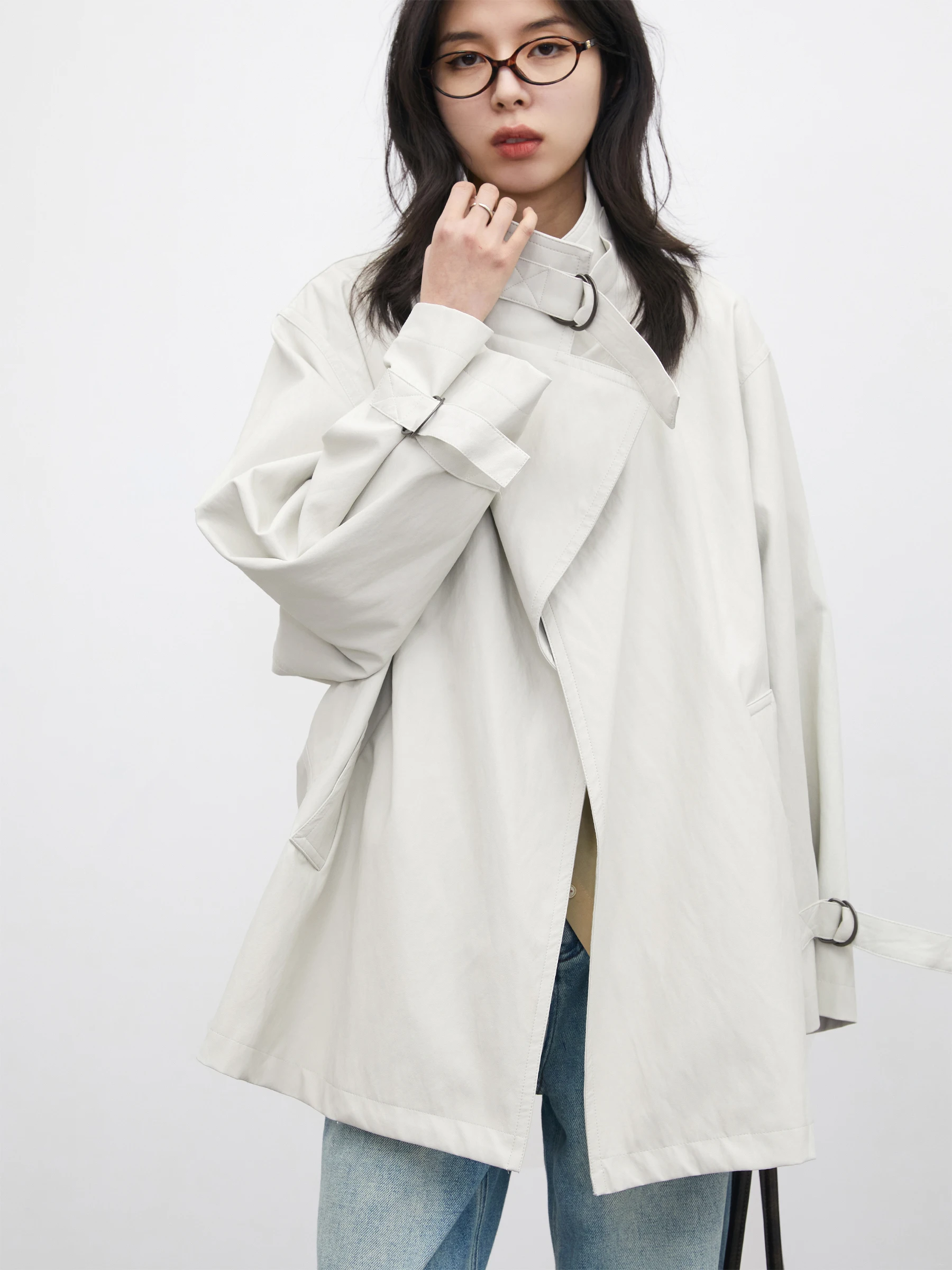 이른 봄 새로운 한국 스타일의 레이지 느낌 프로틴 가죽 D-링 코트 중간 길이 윈드브레이커 아우터 시크 벤 브랜드