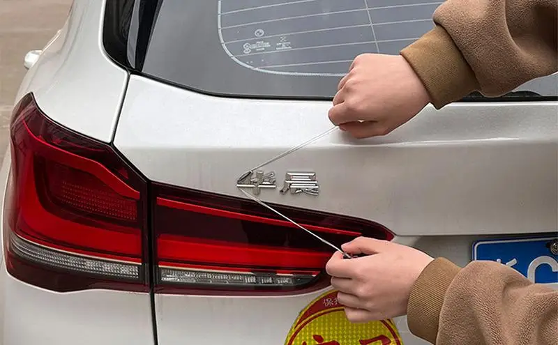 Car Vehicle Emblem Logo Spoiler Stripping Peeling Tool strumento di rimozione dell'emblema dell'auto strumento di avvolgimento automatico del vinile per Badge della targhetta dell'auto