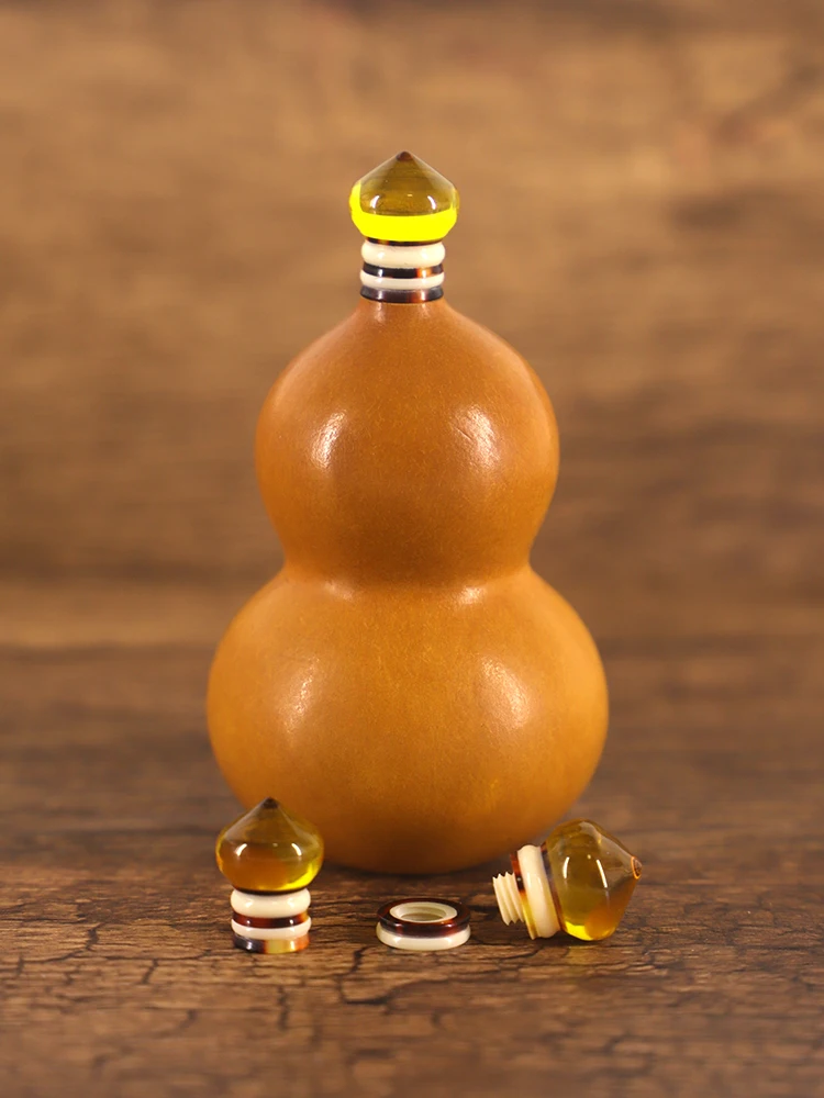 Pointed hat imitation amber gourd inlay without faucet natural fenugreek accessories wenwan high-end plug play ornaments.