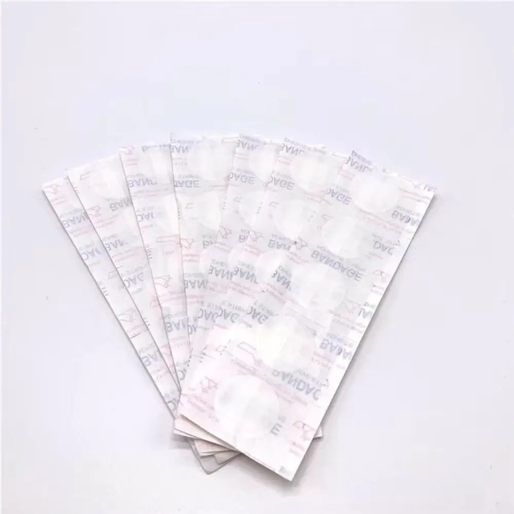 100Pcs 뜨거운 미니 방수 BandAid 통기성 둥근 모양 접착 붕대 상처 첫 번째 고정 테이프 상처 드레싱