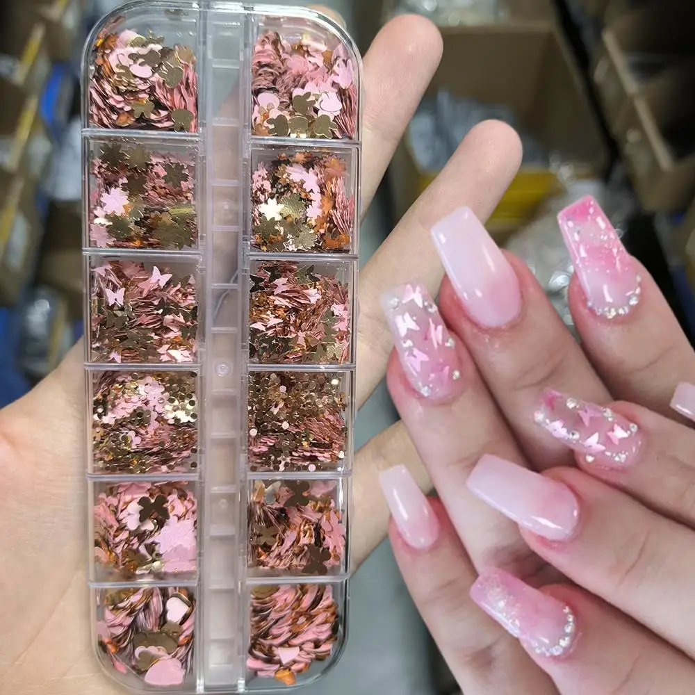 กลิตเตอร์ตกแต่งเล็บ 12 ช่อง 3 มิติ สีชมพูและสีทอง ลายหัวใจ ผีเสื้อ ดอกซากุระ สำหรับตกแต่งเล็บ คริสต์มาส DIY