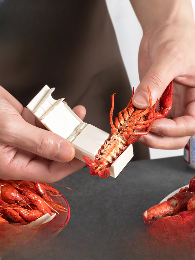 

A new type of shell opening and meat picking tool for crayfish shellers