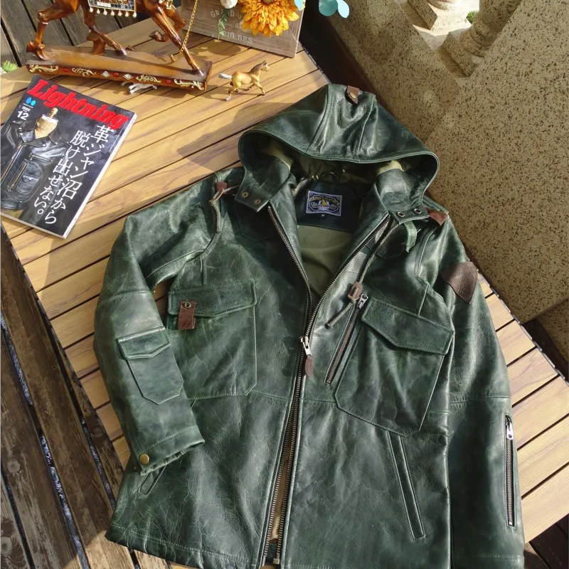 

Верхний слой кожи и пальто с девятью карманами и капюшоном растительного дубления, окрашенный воском