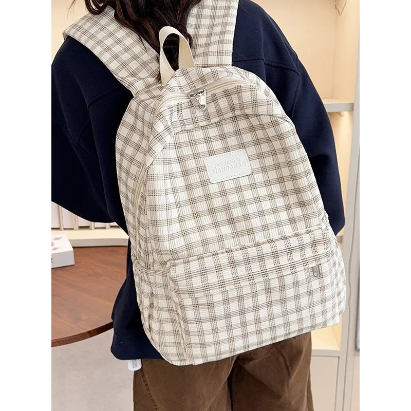 

School bag for junior high school girls, college students, high school students, niche large-capacity corduroy new style backpac