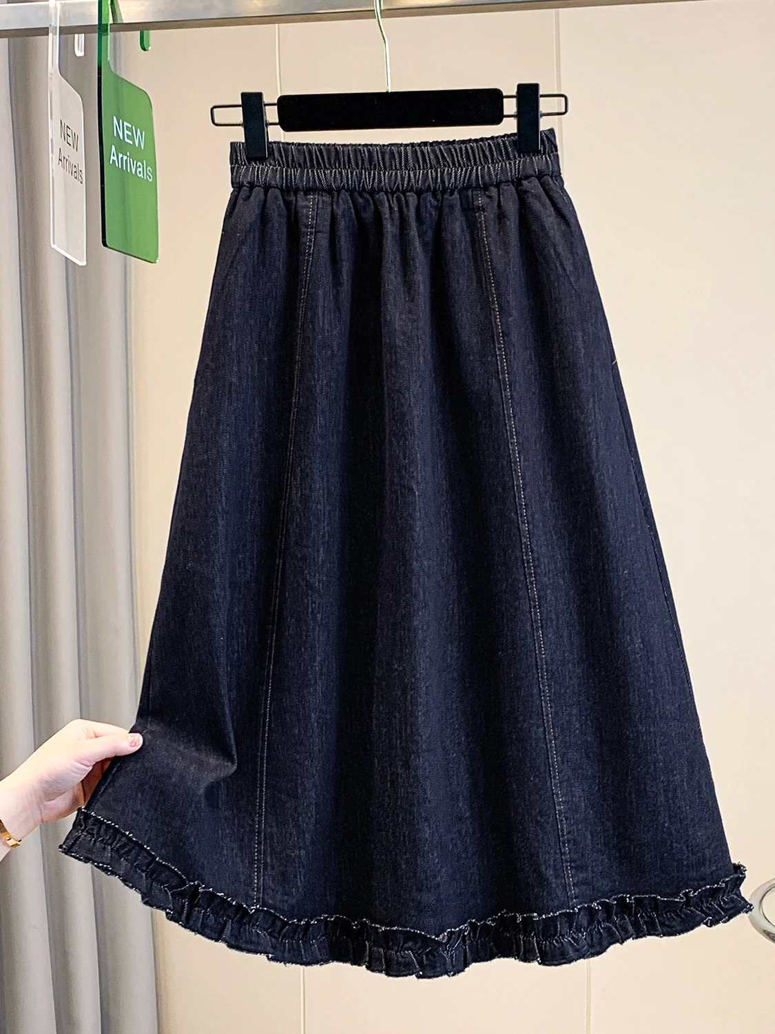 

Джинсовая юбка А-силуэта с высокой талией на резинке для полных женщин: новая модная модель весна-лето, стройнящая фигуру