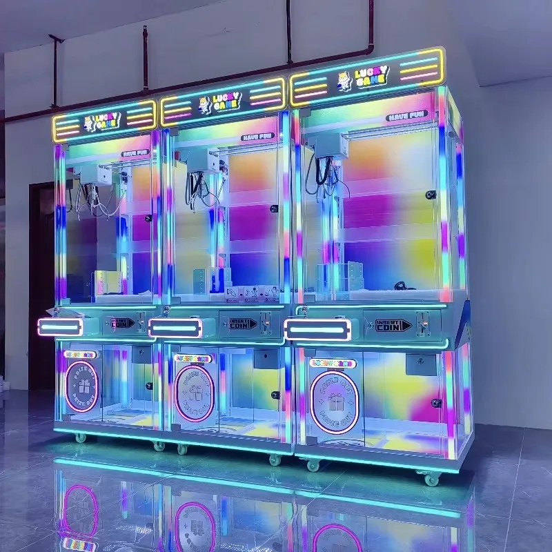 【2026】آلة ألعاب مخلب ألعاب من القطيفة تعمل بقطع النقود المعدنية مع خزانة شفافة