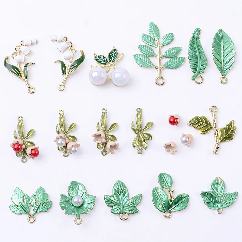 DIY handmade literary and fresh lily of the valley earrings flower leaf alloy pendant spot wholesale