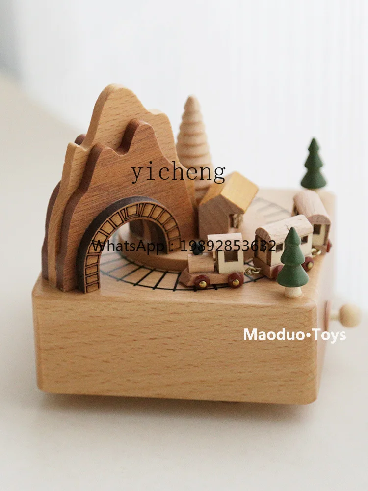 Drewniany, obrotowy pozytywka w kształcie małego pociągu, pozytywka ręcznie nakręcana dla chłopców i dziewczynek, dla niemowląt i dzieci.