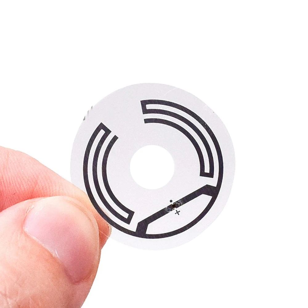 ISO18000-6C(6B) 860-960MHZ عملة نمط UHF RFID علامة التسمية ضياء = 25 مللي متر 1000 قطعة/لفة