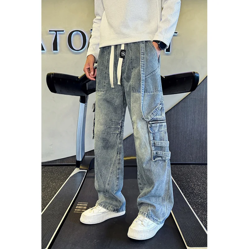Celana Jeans Pria Berkualitas Tinggi GIOIOMen, Celana Denim Kasual Cargo Multi-Kantong dengan Tali Serut di Pinggang, Musim Gugur Musim Dingin 2025