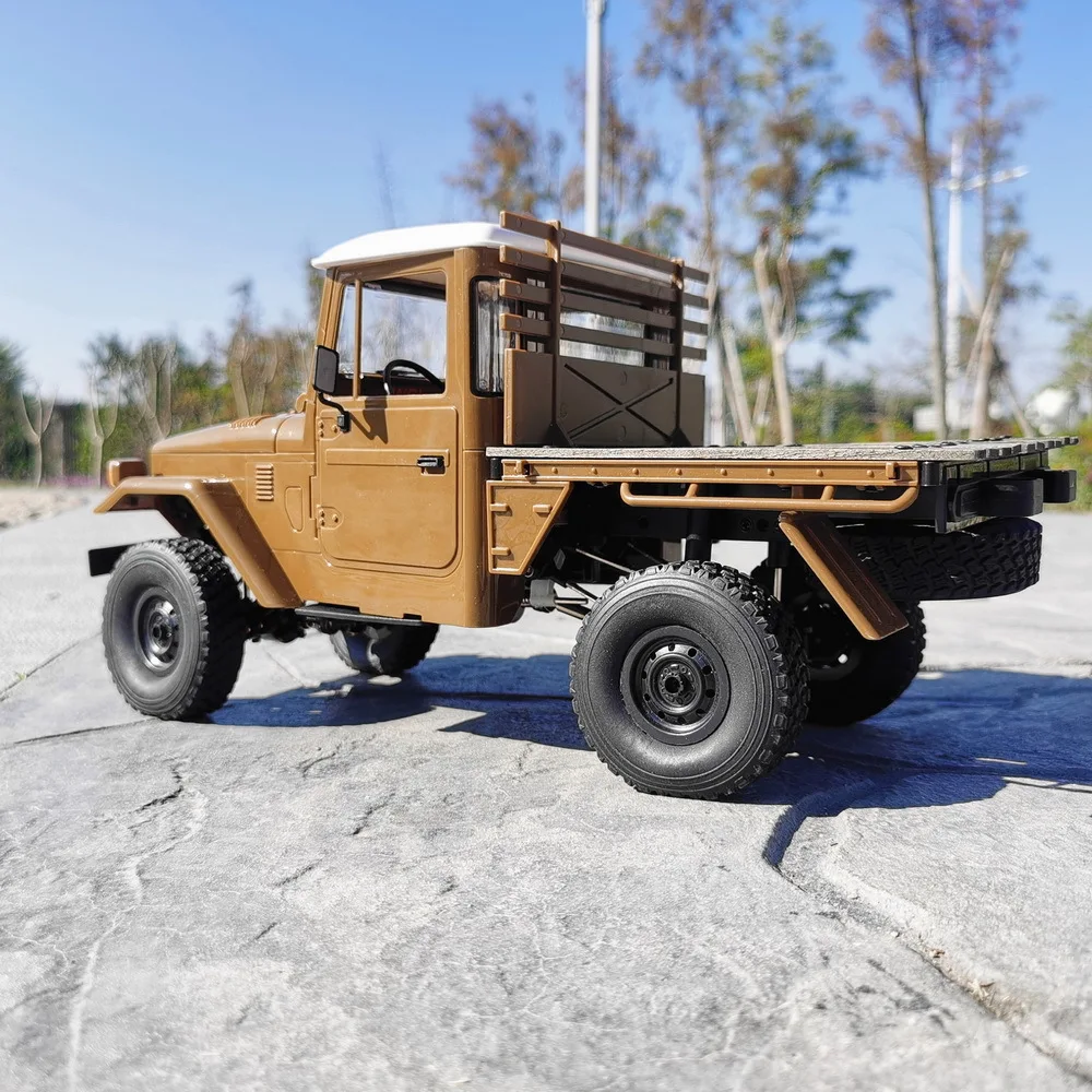 Wpl C-44 مقياس كامل 2.4 جرام Rc شاحنة صحراوية دلو خلفي Rtr ألعاب التحكم عن بعد سيارات للأولاد تسلق عربات التي تجرها الدواب نموذج محاكاة