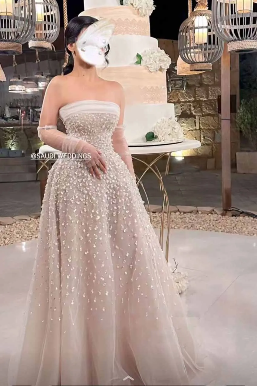 

Elegant Strapless Beaded Pearls Sleeveless A Line Floor Length Prom Dress 2024
