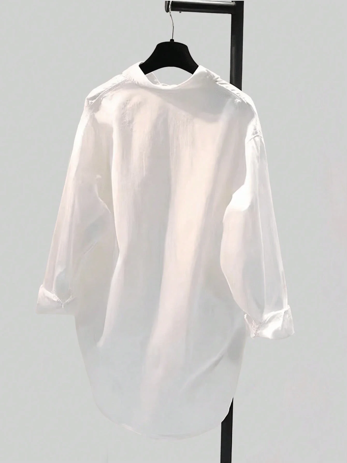 

Minimalist White Long Sleeve Loose Shirt With Asymmetric Hem