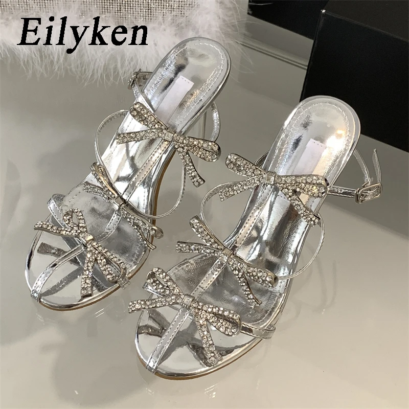 Eilyken Sexy Summer Crystal Butterfly-knot Pointed Toe Women Pumps Fashion Buckle Strap High Heels Party Prom Sandals Mule Shoes