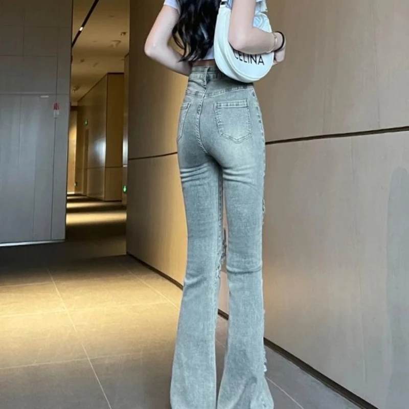 Calças de brim femininas queimadas flare fino ajuste calças de cowboy femininas 2025 alta qualidade harajuku moda vibrante cabido novo em calças legais