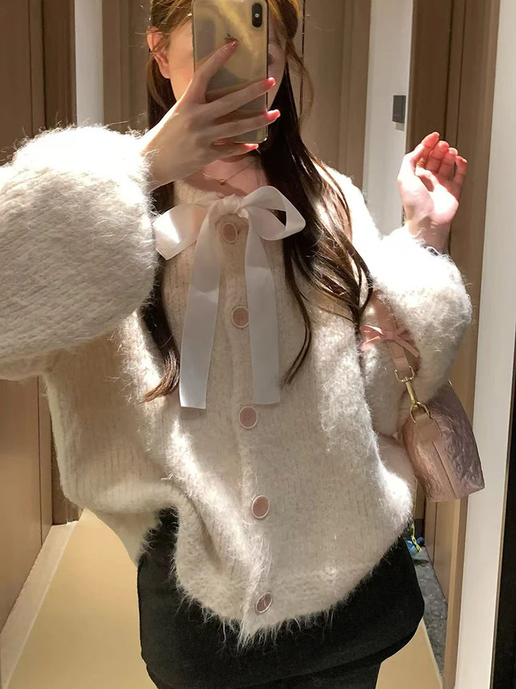 

Милый кавайный вязаный кардиган, женский свободный свитер на пуговицах с бантом и длинными рукавами, ленивый ветер, милый повседневный свитер в консервативном стиле с круглым вырезом, нежные студенческие топы