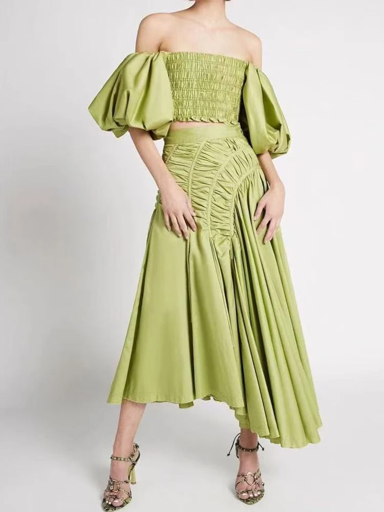

In the summer of 2025, the new two-piece one-word collar bubble sleeve elastic short top+high waist skirt fashion women's suit.