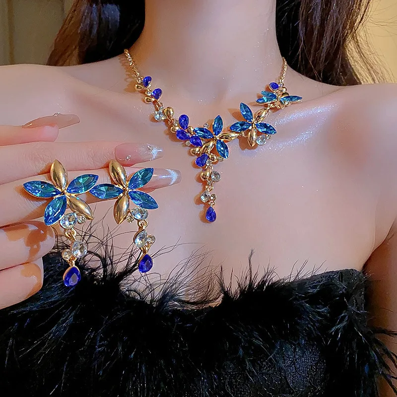 

New earrings necklace set women's alloy inlaid crystal full crystal flower jewelry exaggerated sweater chain wholesale