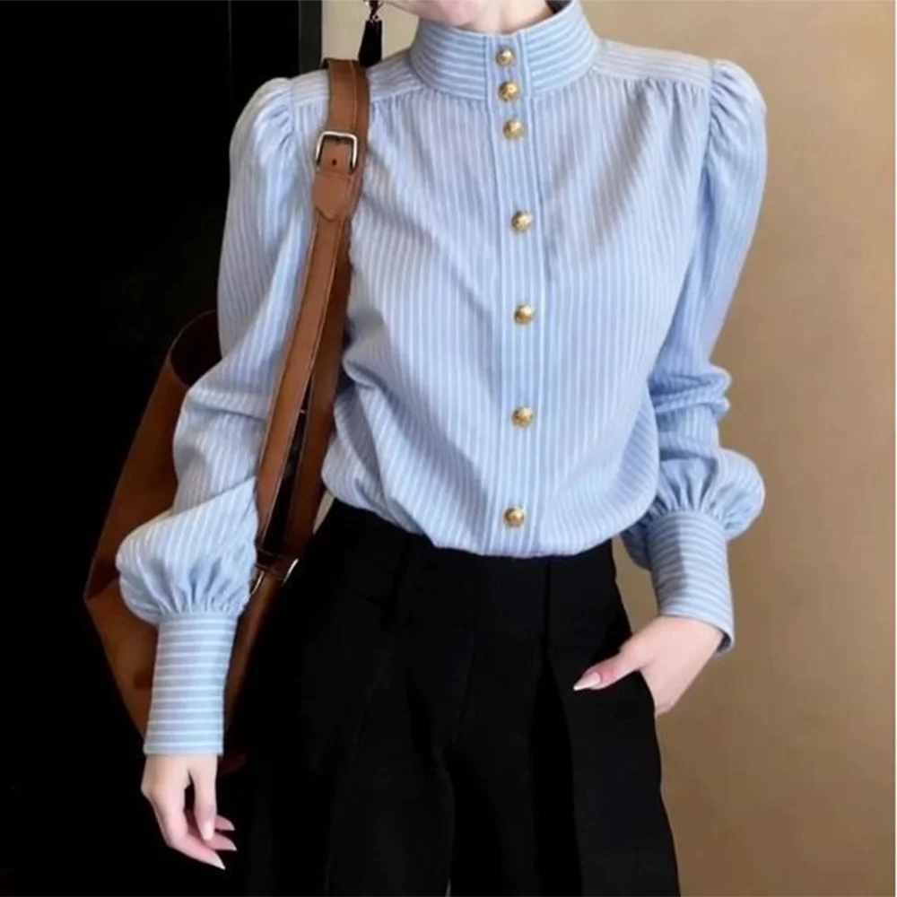 

Blue striped lantern sleeve shirt 2026 spring new design sense high sense single breasted top niche versatile