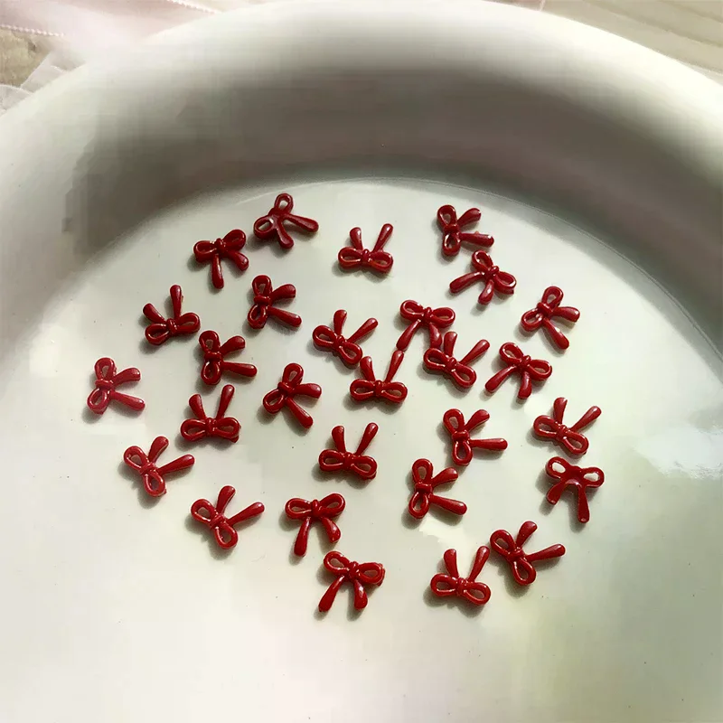 100 個 3D ネイルアート赤い弓チャーム用品かわいいアクセサリー樹脂爪の装飾製品マニキュア装飾材料ツール