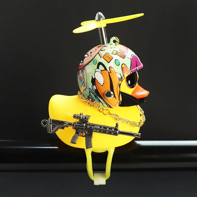 

Yellow Duck with Weapon Gun Strap Motorcycle Decoration Duck Helmet with Propeller Sunglasses Decor Ornaments for Car Dashboard