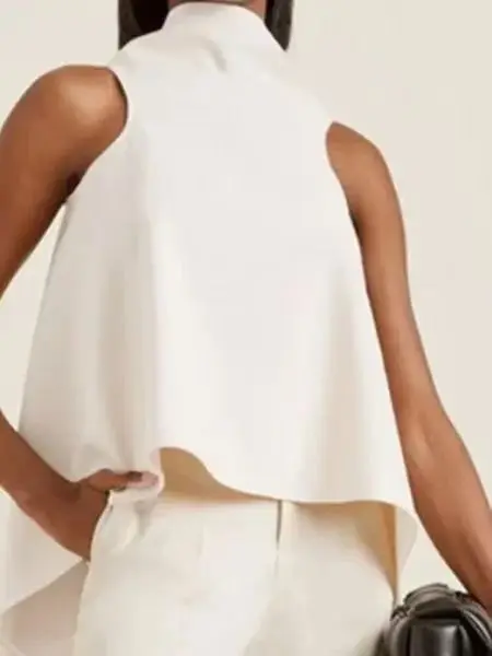 ยุโรปและสหรัฐอเมริกาฤดูใบไม้ผลิและฤดูร้อนไม่สม่ําเสมอ Hem เสื้อแขนกุดอารมณ์เสื้อเชิ้ตสีขาวผู้หญิง