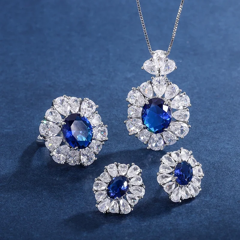 NewJewelry Fashion Jewelry Set Simulated Tanzanian Blue Treasure Pendant 10 * 12 Earring Ring 6 * 8 Three Piece Set