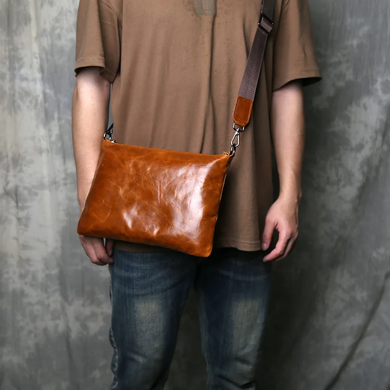 حقيبة كروس كلاسيكية من الجلد المشمع والحبوب العلوية 2025 تصميم جديد بسيط للجنسين محفظة بمقبض ذات سعة كبيرة #3