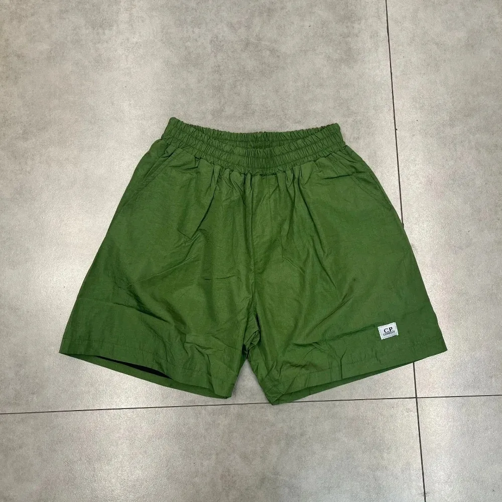 شورت صيفي أوروبي وأمريكي CP مطبوع عليه حروف شورت ثلاثي الأبعاد مناسب لكل من الرجال والنساء