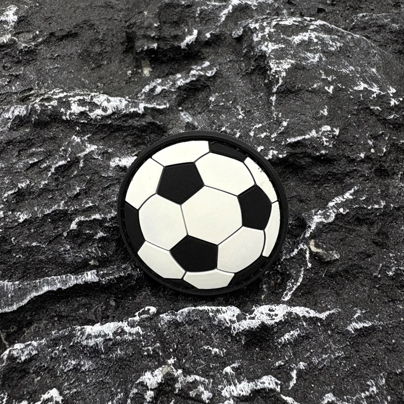 A Football Pvc Patch Badge with a Luminous Effect, Velcro Backing with Hook and Loop Fasteners, Suitable for Decorating Bags, Backpacks, Vests, and Clothing